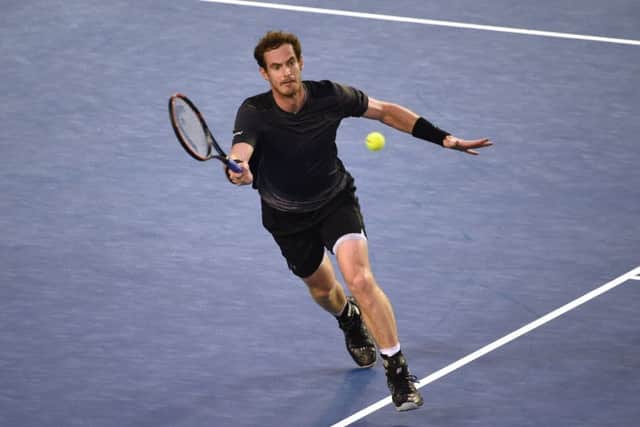 Andy Murray saw off Bernard Tomic to advance to the last eight. Picture: AFP/Getty