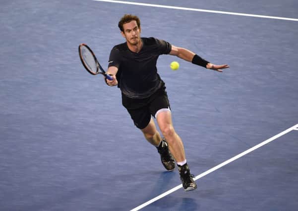 Andy Murray saw off Bernard Tomic to advance to the last eight. Picture: AFP/Getty
