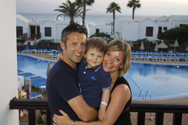 Aidan with his parents Barry and Natalie