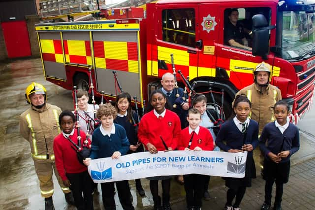 Some of the pupils learning the pipes thanks to the initiative of the Trust. Picture: Wullie Marr/HPR
.