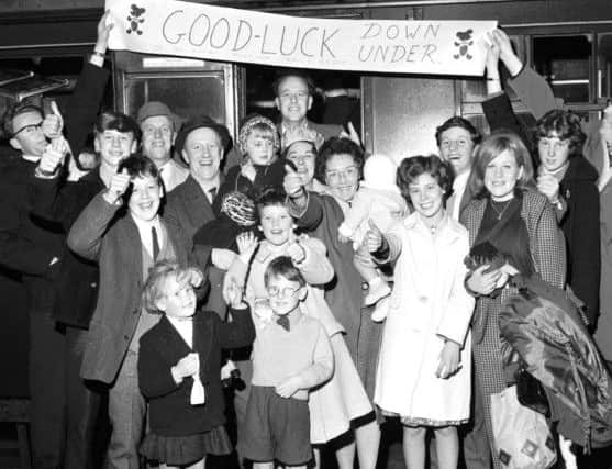 A group of wellwishers join the Morrison family in 1964 as they prepare to leave Waverley station in Edinburgh bound for Australia. Picture: Crauford Tait/TSPL
