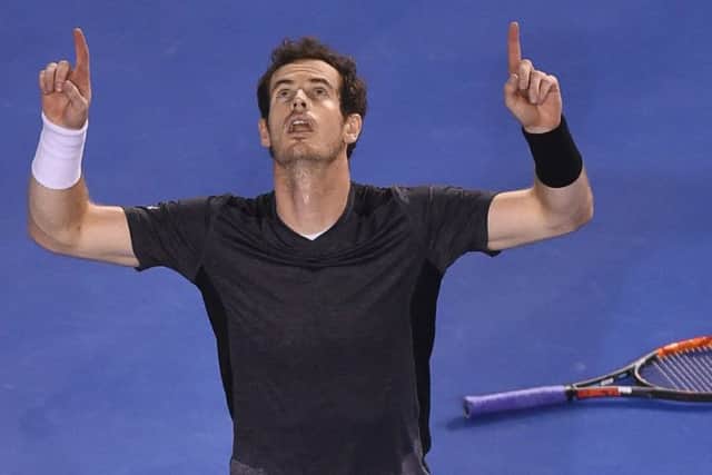 Britain's Andy Murray celebrates after victory in his men's singles match against Australia's Bernard Tomic. Picture: AFP/Getty Images