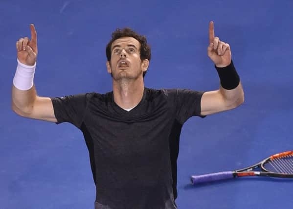 Britain's Andy Murray celebrates after victory in his men's singles match against Australia's Bernard Tomic. Picture: AFP/Getty Images