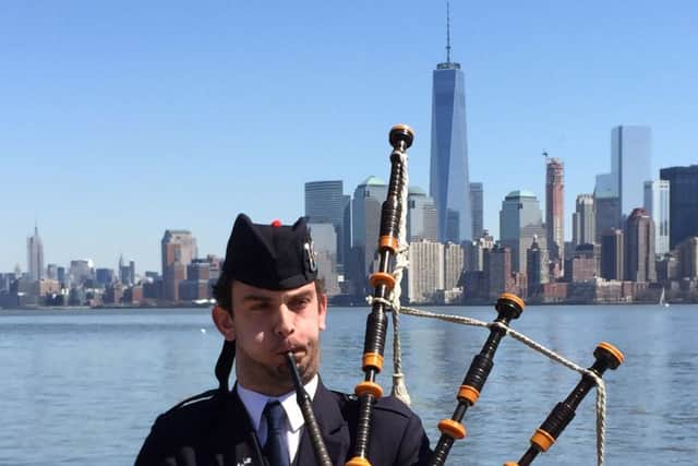 Piper plays the world premiere of The Immigrant's Lament, commissioned by the Clan Currie Society, on Ellis Island.
