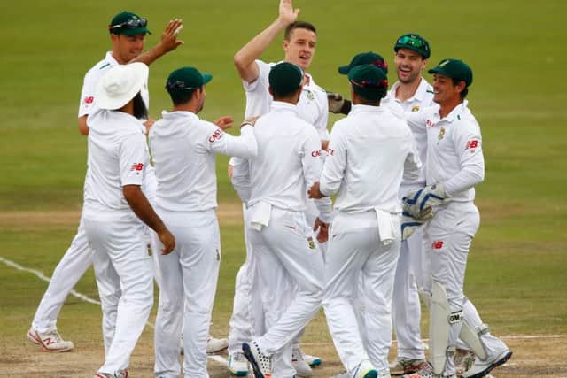 South Africas Morne Morkel, centre, celebrates his caught and bowled to dismiss Alastair Cook. Picture: Getty