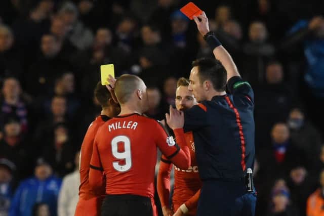 Rangers' Andy Halliday (left) is shown a red card. Picture: SNS
