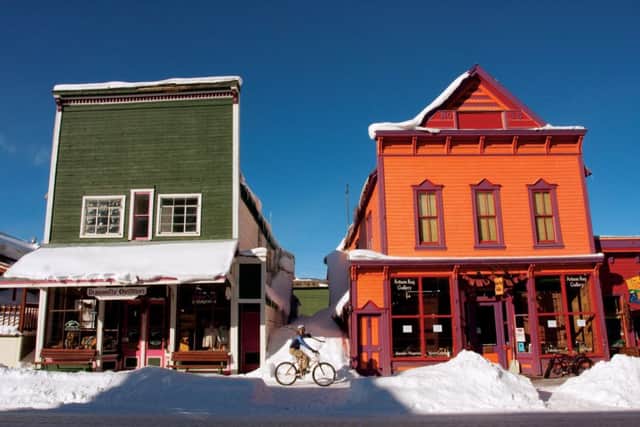 The colourful houses of Crested Butte stand out against the snow