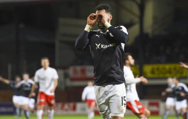Dundee striker Kane Hemmings celebrates after opening the scoring. Picture: SNS