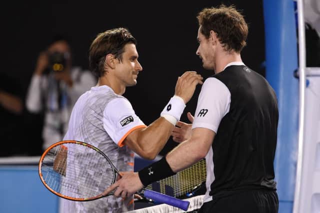 Ferrer congratulates Murray at the end. Picture: AFP/Getty Images