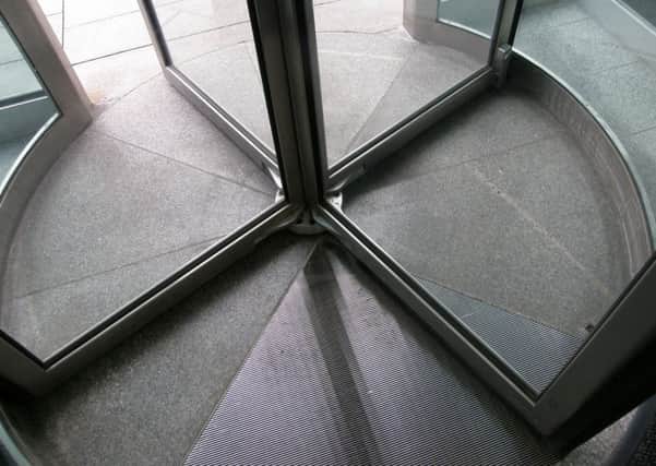 A revolving door instruction email was released after a professor hurt their arm in one