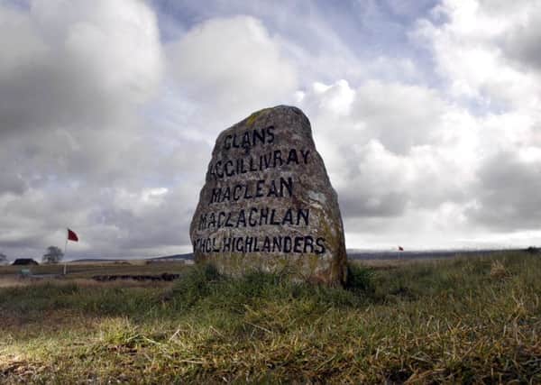 A stone located on the Drumossie Moor, marking the site of a fallen clan at the Battle of Culloden. Picture: Jane Barlow