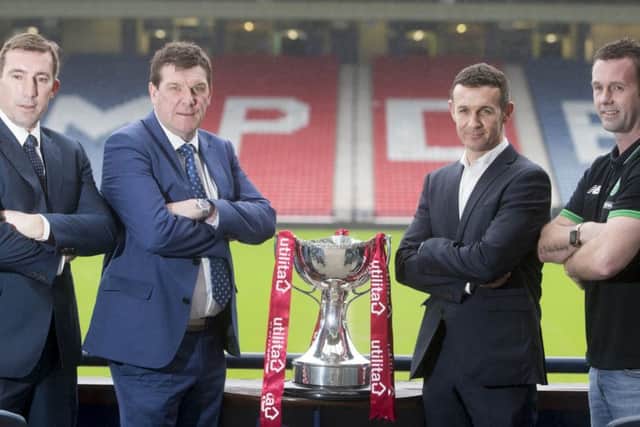 Alan Stubbs, left, lines up at Hampden with fellow semi-final managers Tommy Wright of St Johnstone, Jim McIntyre of Ross County and Ronny Deila of Celtic. Picture: PA