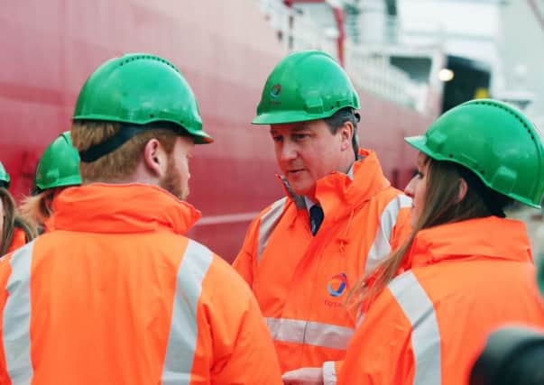 Prime Minister David Cameron during a tour of Aberdeen Harbour. Picture: PA
