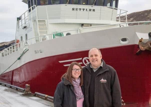 Marianne and Gilbert Clark of North Isles Marine with the MV Settler