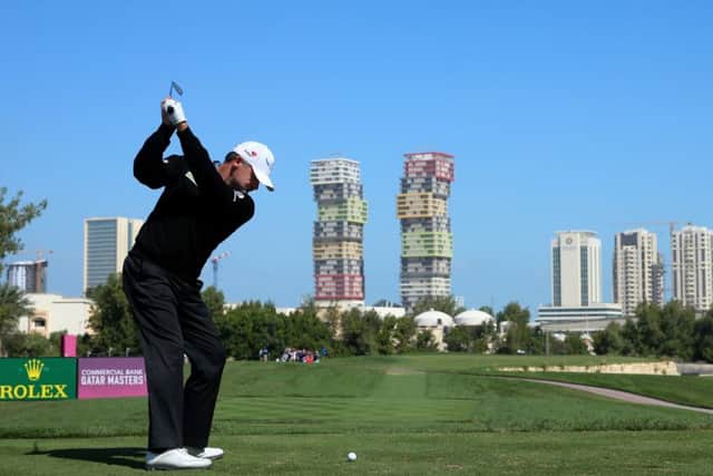 Paul Lawrie plays his tee-shot at the third hole of the Doha Golf Club  on his way to 16 pars and two birdies in his third round. Picture: Getty