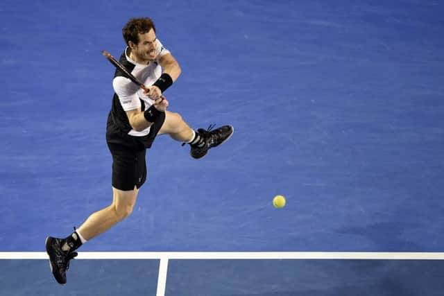 Andy Murray plays a backhand return en route to victory over Milos Raonic in the Australian Open semi-finals. Picture: Andrew Brownbill/AP