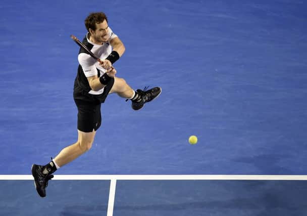 Andy Murray plays a backhand return en route to victory over Milos Raonic in the Australian Open semi-finals. Picture: Andrew Brownbill/AP