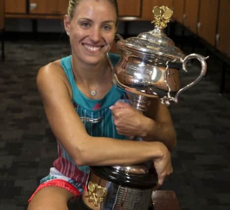 Angelique Kerber of Germany poses with the Daphne Akhurst Trophy