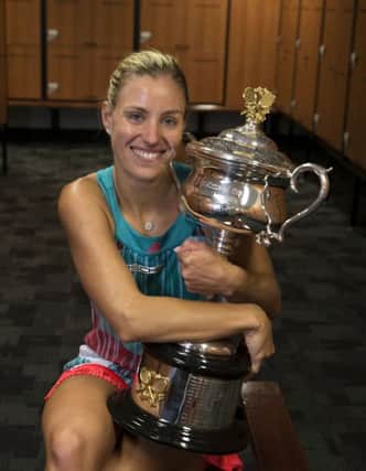 Angelique Kerber of Germany poses with the Daphne Akhurst Trophy