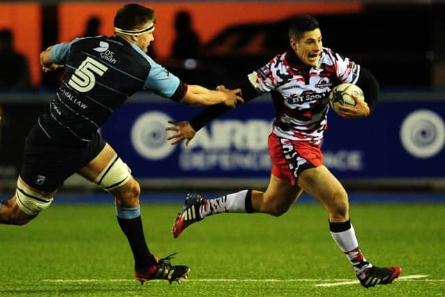 Edinburgh's Phil Burleigh under pressure from Cardiff Blues' James Down. Picture: Kevin Barnes/CameraSport