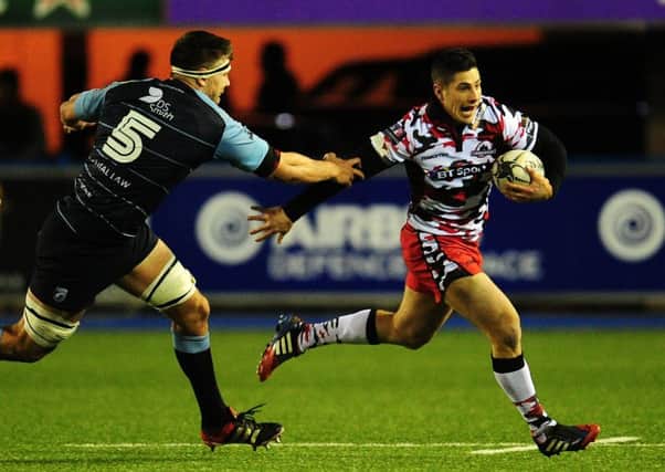 Edinburgh's Phil Burleigh under pressure from Cardiff Blues' James Down. Picture: Kevin Barnes/CameraSport