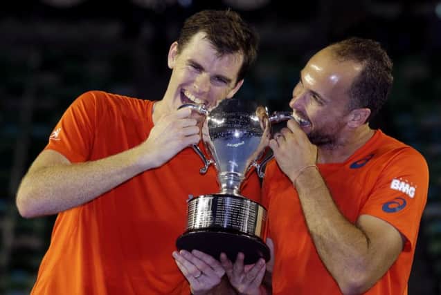Jamie Murray and Bruno Soares with the doubles trophy. Picture: AP