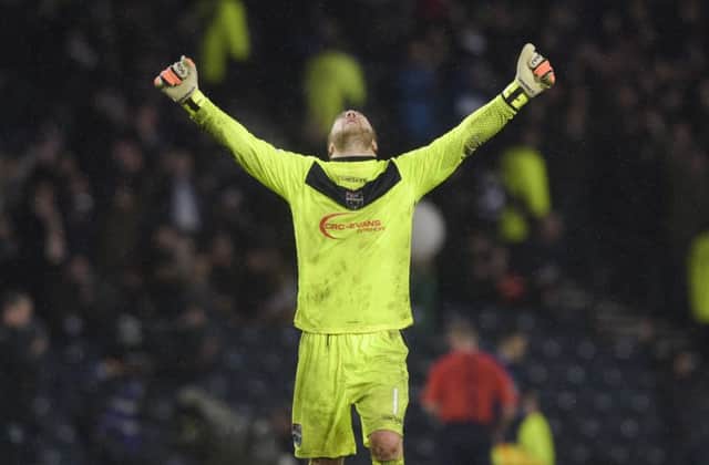 Ross County's Scott Fox celebrates at full-time. Picture: SNS