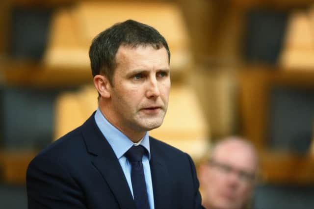 Michael Matheson made the comments as legislation to axe the move for those sentenced to four years or more behind bars came into force. Picture: Andrew Cowan