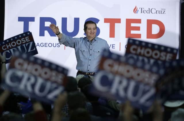 Republican presidential candidate Ted Cruz waves to supporters at Iowa State Fairgrounds in Des Moines. Picture: AP
