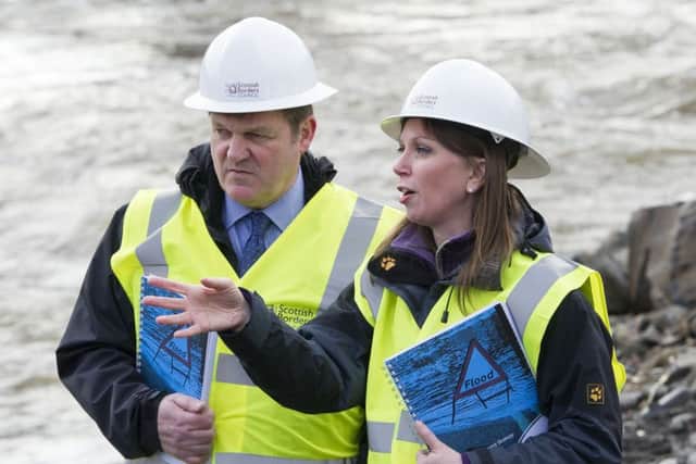 Sepa chief executive Terry A'Hearn and environment minister Aileen McLeod visit a flood protection scheme in Selkirk. Picture: Ian Rutherford