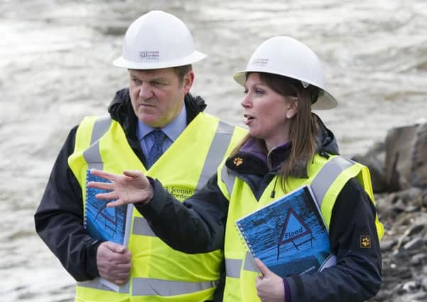 Sepa chief executive Terry A'Hearn and environment minister Aileen McLeod visit a flood protection scheme in Selkirk. Picture: Ian Rutherford