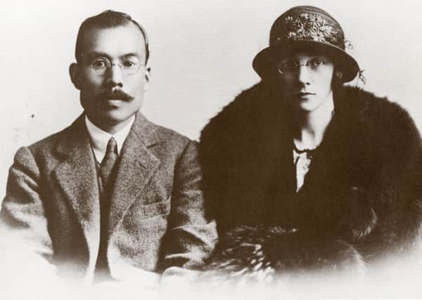 Masataka Taketsura with his wife, Rita.