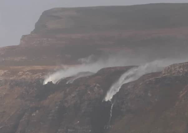 Waterfalls are blown upwards by 80mph winds on the Isle of Mull