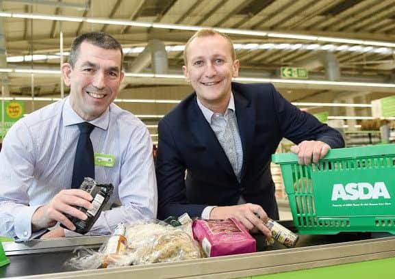 Asda's Allan Miller, left, with SIS chief Alastair Davis. Picture: Greg Macvean