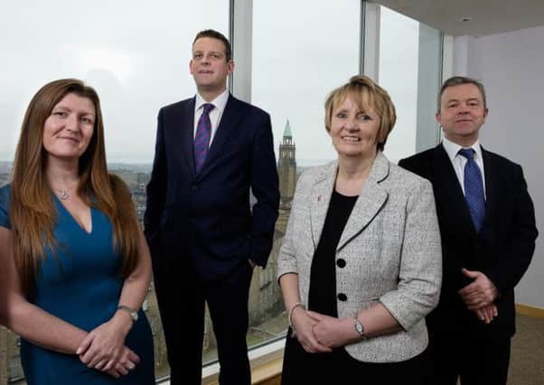Cornerstone's new hires, from left: Suzanne Reid, Scott Snedden, Louise Melville and Alan Reid