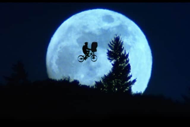 An iconic still from E.T., whose score will be performed by the RSNO later this year