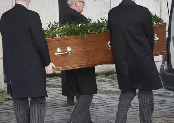 Ministers are facing calls to foot the bill of basic funerals. Picture: Greg Macvean