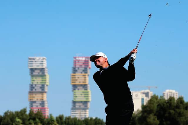 Paul Lawrie of Scotland plays his second shot on the 5th during the final round of the Commercial Bank Qatar Masters at the Doha Golf Club on January 30, 2016 in Doha, Qatar.  (Photo by Andrew Redington/Getty Images)