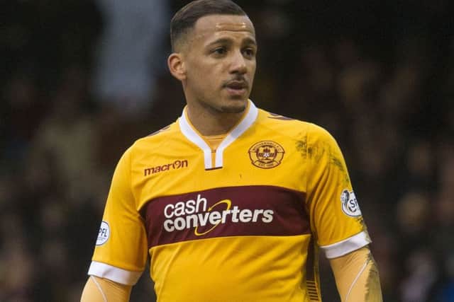 Motherwell's Lionel Ainsworth was blamed for Partick's late winner. Picture: SNS