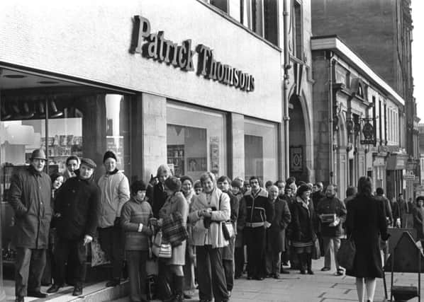 Fans of American singer Perry Como queue outside Patrick Thomsons department store in the High Street for tickets to his Edinburgh concert in January 1975.