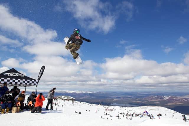 A snowboarder enjoys the slopes on the Cairngorm. Picture: Paul Campbell