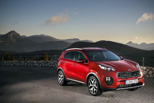 The grille of the latest Sportage is far more imposing