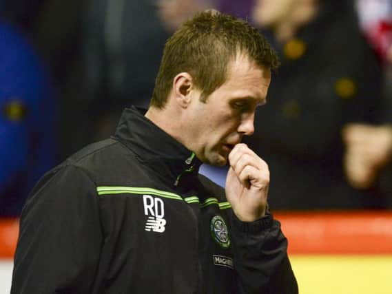 Celtic manager Ronny Deila cuts a dejected figure after his side's midweek league defeat at Pittodrie. Picture: Rob Casey/SNS Group.
