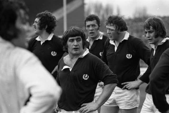 Scotland captain Ian McLauchlan pauses ahead of a scrum with fellow forwards (from left) Alan Tomes, Alastair McHarg, Gordon Brown and David Leslie.
