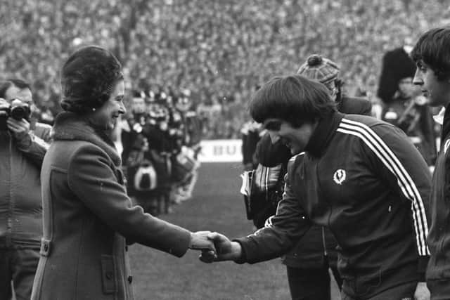 The Queen meets Scotland captain Ian McLauchlan before the match at Murrayfield.