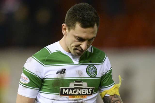 The Celtic captain walks off after his side's loss to Aberdeen on Wednesday. Picture: SNS