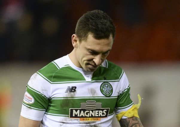 The Celtic captain walks off after his side's loss to Aberdeen on Wednesday. Picture: SNS