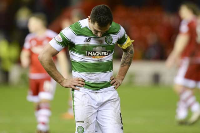 Scott Brown was disconsolate in midweek but is confident Celtic will prevail at the end of the season. Picture: Rob Casey/SNS Group