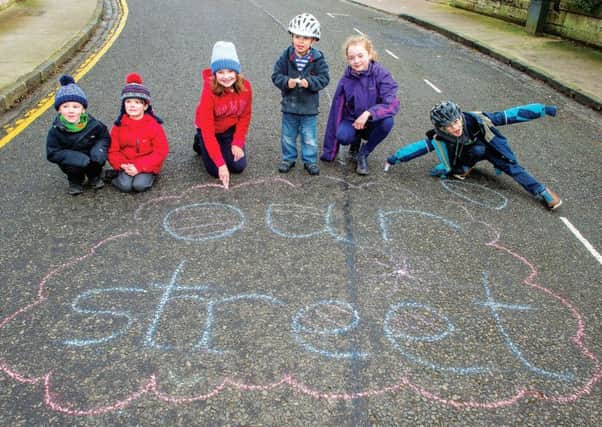 Children from Edinburgh Playing Out make the road their playground. Picture: Ian Georgeson