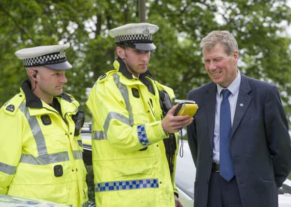 Former Scottish justice secretary Kenny MacAskill, right. Picture: Steven Scott Taylor